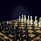 Шахматы "Шелл" из морёного дуба с инкрустацией янтарём