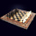 Шахматы "Арабески Тина" 56х56 см из корня ореха с инкрустацией янтарём